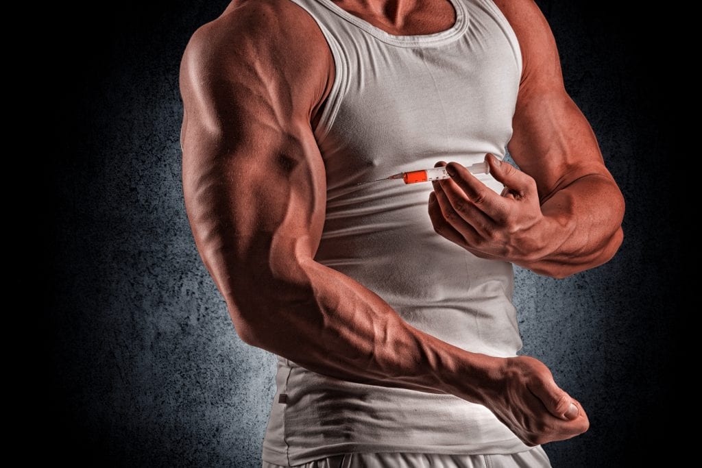 An athlete having an injection of testosterone.